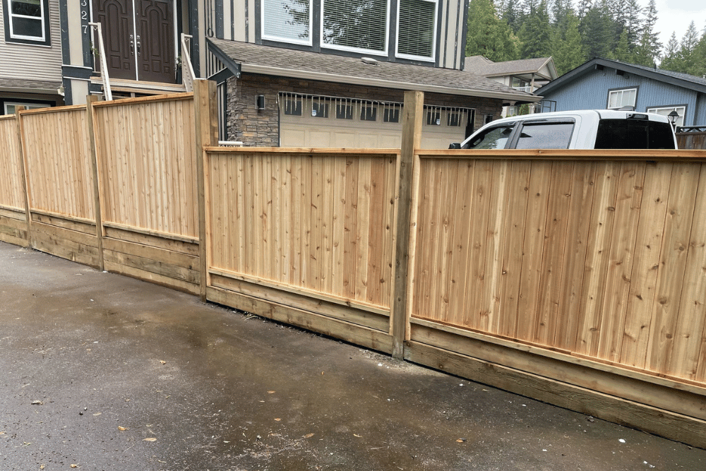 Cedar privacy fence installed by fence contractors in Abbotsford driveway